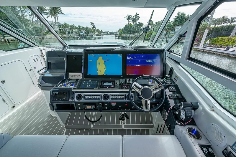 Slide: The Image of 2022 Formula 430 All Sport Crossover helm with advanced navigation displays. - 5