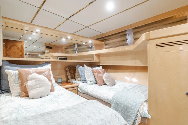 Slide: The Image of Luxurious cabin interior of 2003 Ocean Alexander 64 Pilothouse yacht with twin beds. - 23