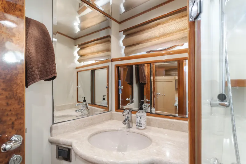 Slide: The Image of Luxurious bathroom in 2003 Ocean Alexander 64 Pilothouse yacht with elegant fixtures. - 27