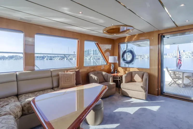 Slide: The Image of Luxurious interior of 2003 Ocean Alexander 64 Pilothouse yacht with elegant seating and scenic views. - 43