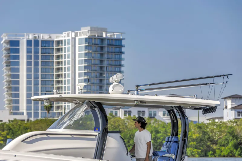 Slide: The Image of Man on 2019 Fountain 43NX boat with cityscape background. - 11