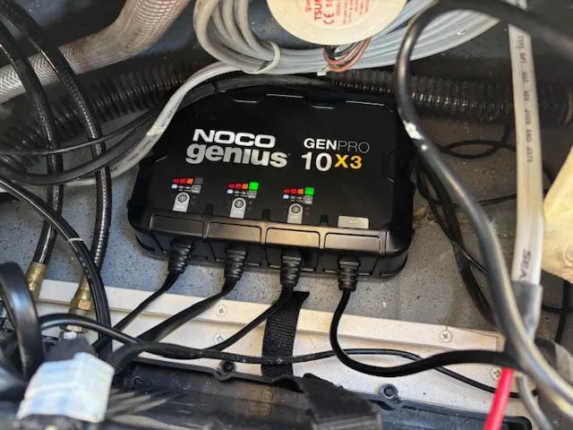 Slide: The Image of NOCO Genius GENPRO 10X3 charger installed in 2024 Sea Chaser 24 HFC boat. - 16