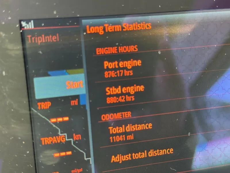 Slide: The Image of Display screen showing long-term statistics for 2017 Axopar 37, including engine hours and total distance. - 27