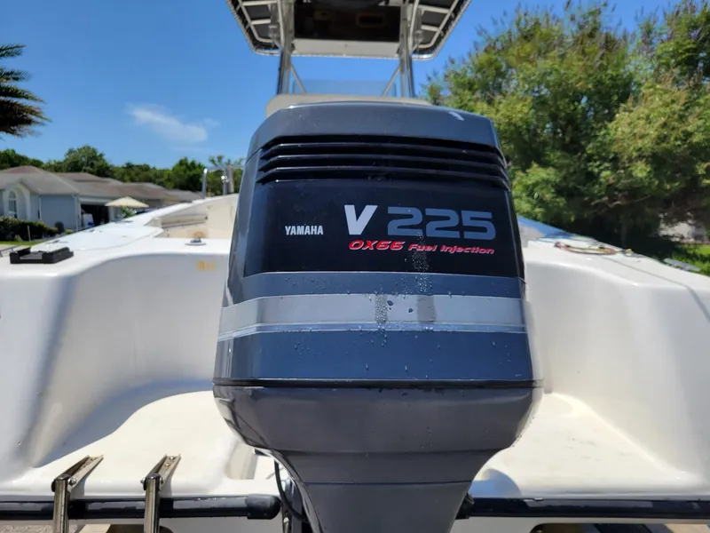 Slide: The Image of Yamaha V225 outboard motor on a 2001 Century 2300 Center Console boat. - 3