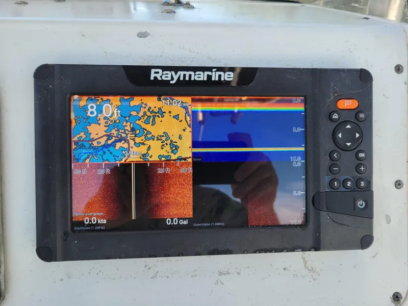 Slide: The Image of Raymarine display on 2001 Century 2300 Center Console boat, showing sonar and navigation data. - 4