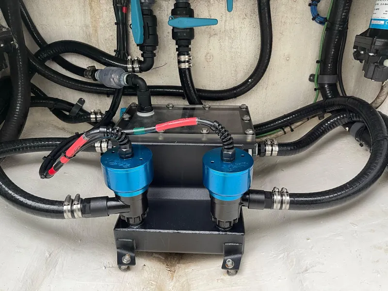 Slide: The Image of Engine compartment of 2018 Yellowfin 36 boat with wiring and components. - 27