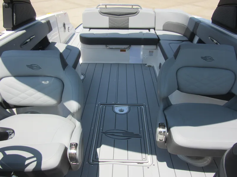 Slide: The Image of 2025 Chaparral 307 SSX boat interior with luxurious seating and modern design. - 11