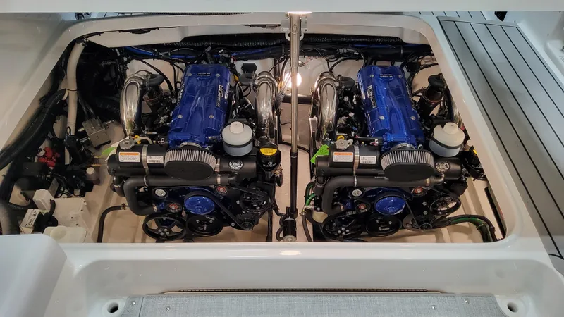 Slide: The Image of 2025 Formula 350 Crossover Bowrider I/O engine compartment with dual engines. - 13