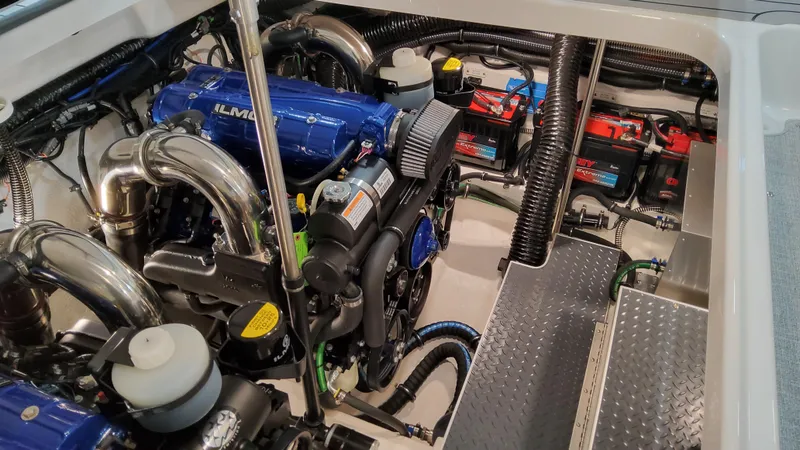 Slide: The Image of Engine compartment of 2025 Formula 350 Crossover Bowrider I/O, showcasing advanced marine mechanics. - 16
