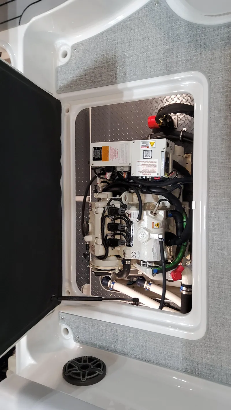Slide: The Image of Engine compartment of 2025 Formula 350 Crossover Bowrider I/O boat. - 18