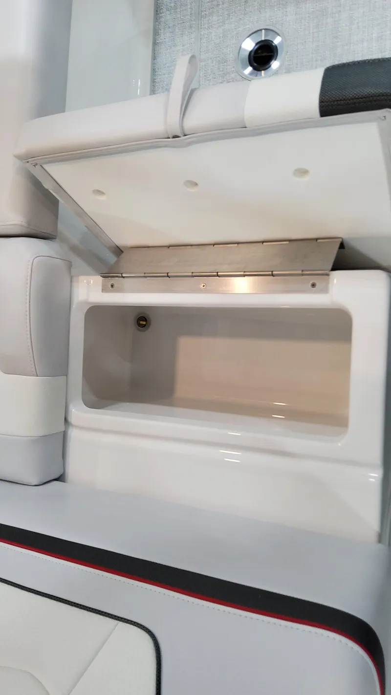 Slide: The Image of 2025 Formula 350 Crossover Bowrider I/O storage compartment with sleek design and modern features. - 23