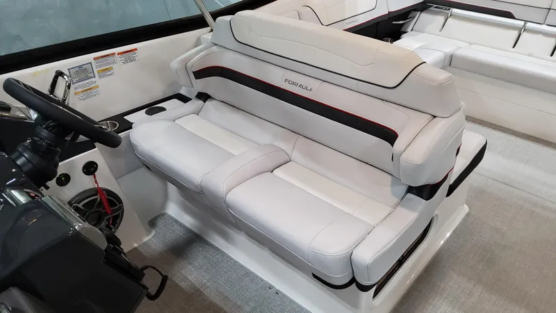 Slide: The Image of 2025 Formula 350 Crossover Bowrider I/O interior with luxurious white seating. - 29
