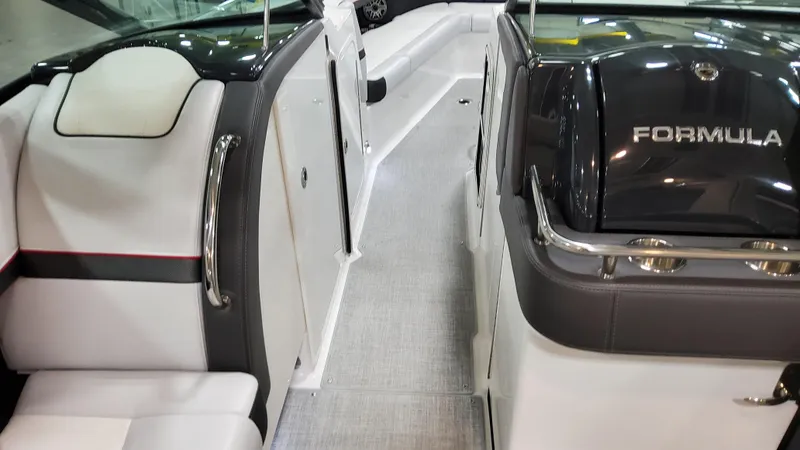 Slide: The Image of 2025 Formula 350 Crossover Bowrider I/O interior with sleek seating and modern design. - 33