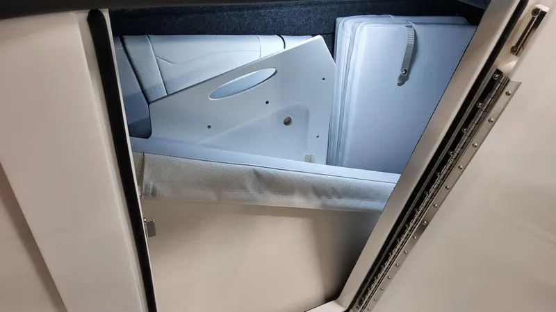 Slide: The Image of 2025 Formula 350 Crossover Bowrider I/O interior storage compartment. - 34