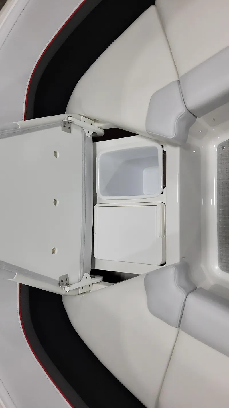 Slide: The Image of 2025 Formula 350 Crossover Bowrider I/O interior with storage compartment open. - 38