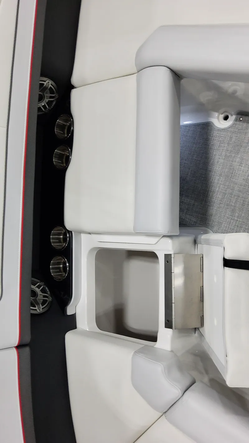 Slide: The Image of 2025 Formula 350 Crossover Bowrider I/O interior with white seating and built-in speakers. - 39