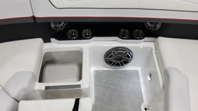 Slide: The Image of Interior of 2025 Formula 350 Crossover Bowrider I/O, featuring cup holders and speaker system. - 40