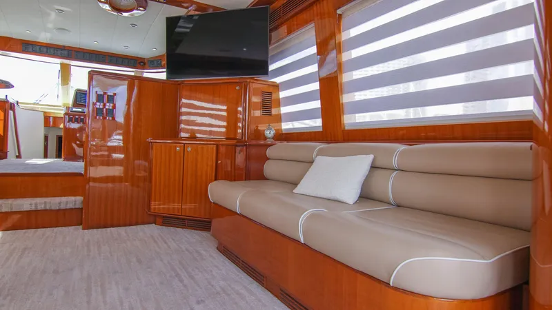 Slide: The Image of Luxurious interior of a 2008 McKinna Pilothouse yacht with plush seating and modern decor. - 13