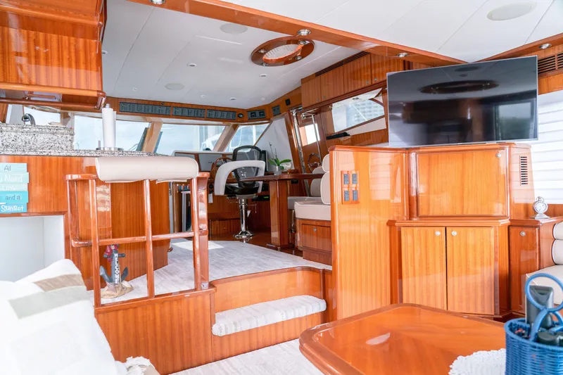 Slide: The Image of Luxurious 2008 McKinna Pilothouse interior with polished wood and modern amenities. - 14