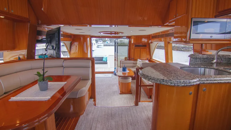 Slide: The Image of Luxurious 2008 McKinna Pilothouse interior with elegant wood finishes and modern amenities. - 19