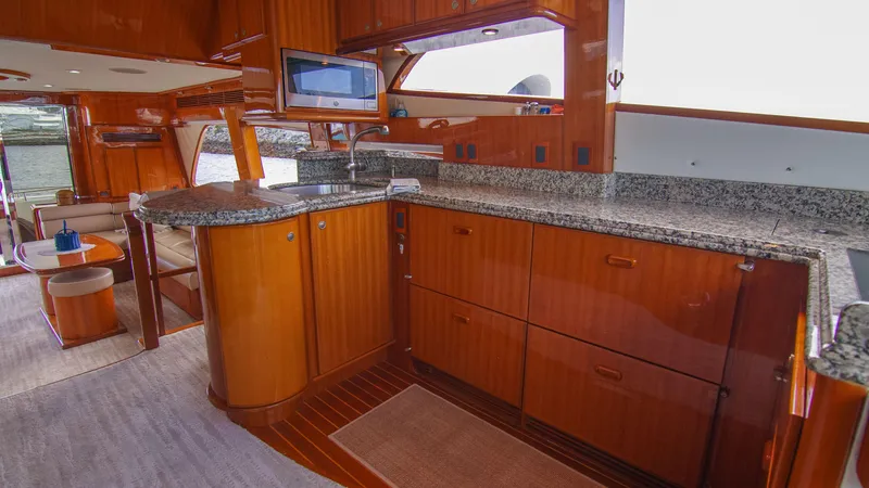 Slide: The Image of Luxurious 2008 McKinna Pilothouse yacht interior with elegant wood cabinetry and granite countertops. - 20
