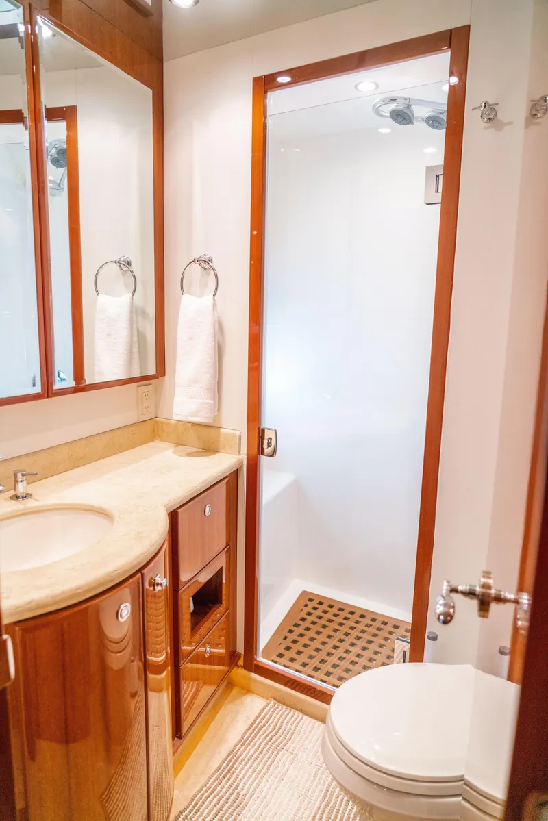Slide: The Image of Luxurious 2008 McKinna Pilothouse yacht bathroom with wood accents and modern fixtures. - 27