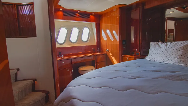 Slide: The Image of Luxurious 2008 McKinna Pilothouse yacht bedroom with elegant wood finishes and natural light. - 29