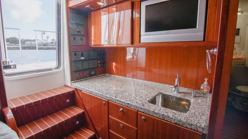 Slide: The Image of Luxurious 2008 McKinna Pilothouse interior with granite countertop and modern amenities. - 37