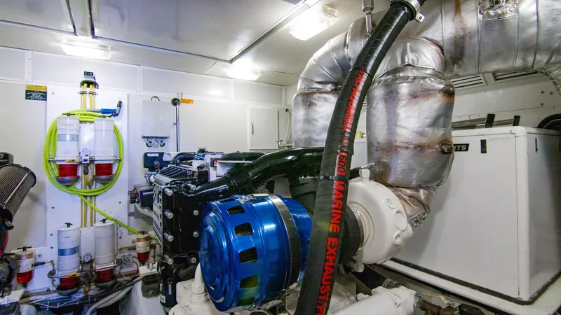 Slide: The Image of Engine room of 2008 McKinna Pilothouse yacht with marine exhaust system. - 39