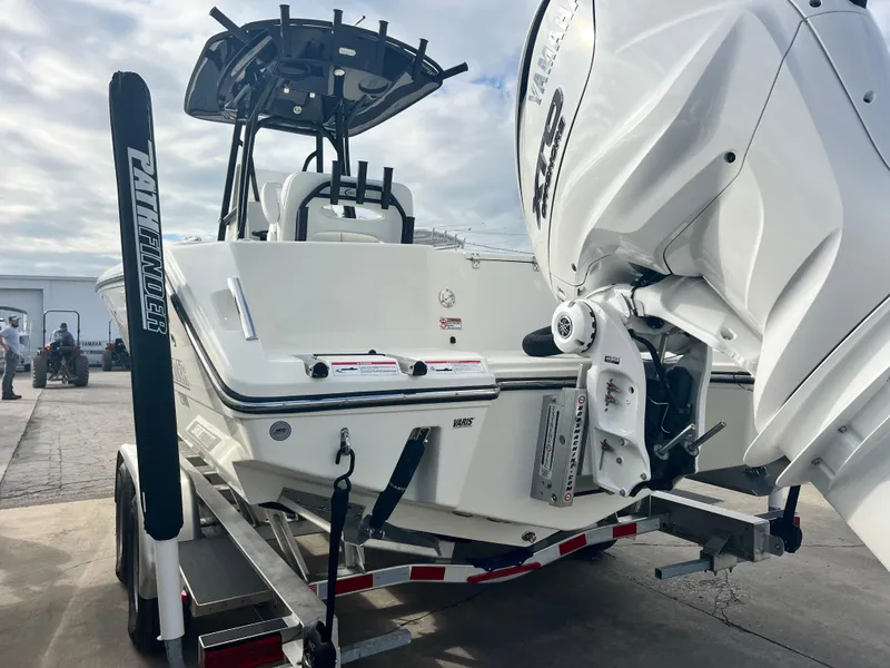 Slide: The Image of 2025 Pathfinder 2700 Open boat on trailer, featuring powerful outboard motor. - 5