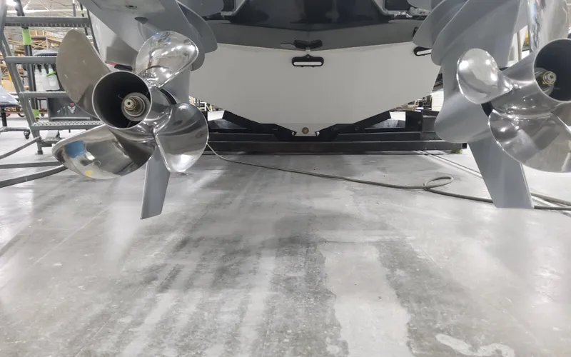Slide: The Image of 2025 Formula 310 Bowrider OB boat propellers in a manufacturing facility. - 10