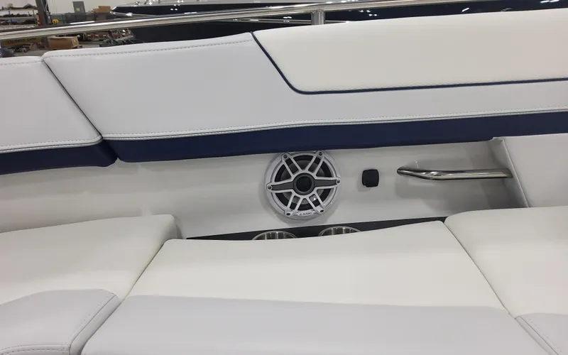 Slide: The Image of 2025 Formula 310 Bowrider OB interior seating with speaker and sleek design. - 21