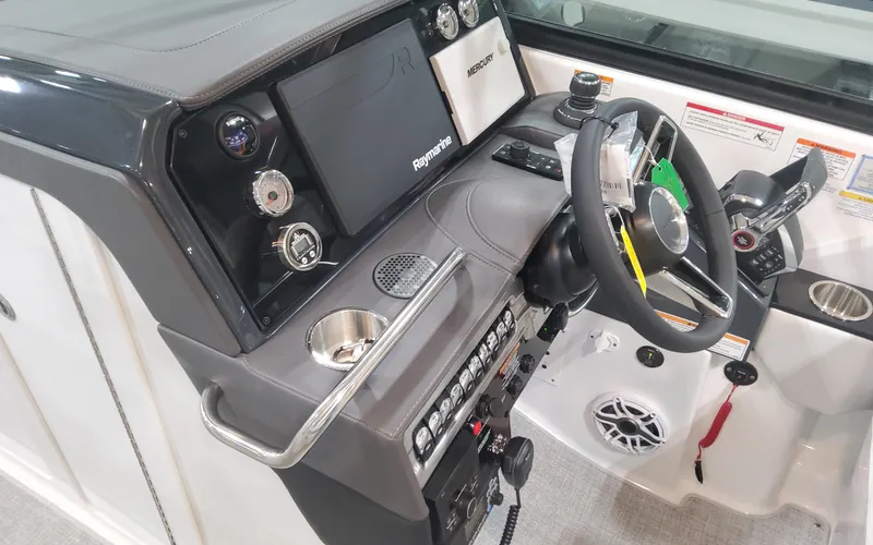 Slide: The Image of 2025 Formula 310 Bowrider OB dashboard with steering wheel and control panel. - 37