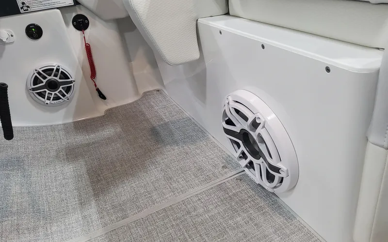 Slide: The Image of 2025 Formula 310 Bowrider OB interior with speakers and carpeted flooring. - 39