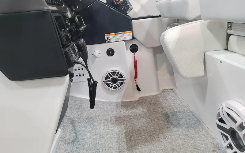 Slide: The Image of 2025 Formula 310 Bowrider OB interior cockpit with speaker and control panel. - 40