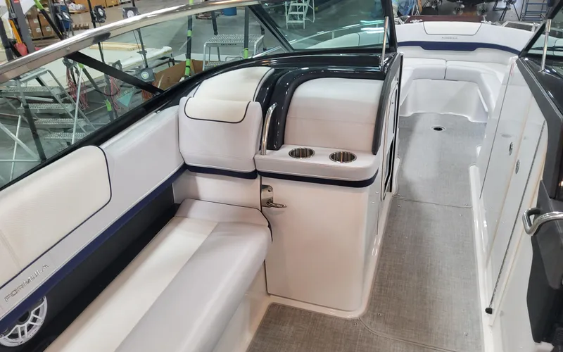 Slide: The Image of 2025 Formula 310 Bowrider OB interior with seating and cup holders. - 42