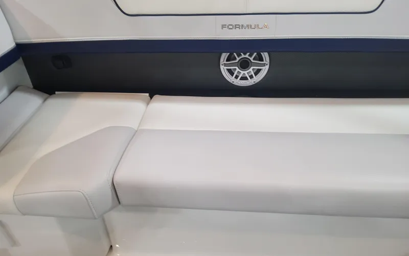 Slide: The Image of 2025 Formula 310 Bowrider OB interior seating with speaker detail. - 45