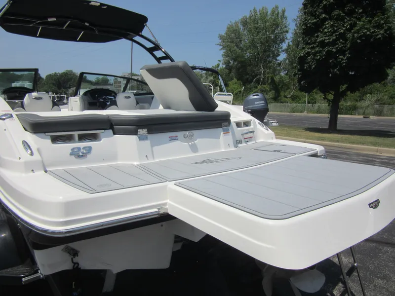 Slide: The Image of 2025 Chaparral 23 SSi boat with spacious rear deck and seating area. - 13