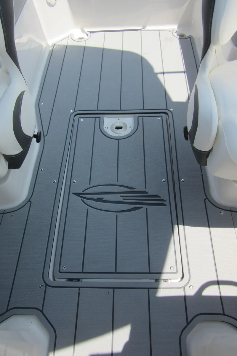 Slide: The Image of 2025 Chaparral 23 SSi boat interior with sleek, modern flooring design. - 27