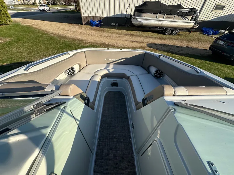 Slide: The Image of 2019 Crownline Eclipse E235 XS boat interior with spacious seating and modern design. - 16