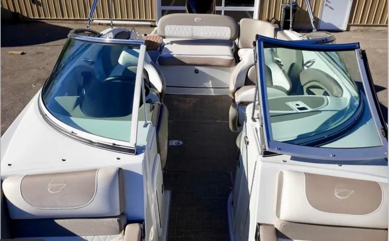 Slide: The Image of 2019 Crownline Eclipse E235 XS boat interior with seating and windshield. - 6