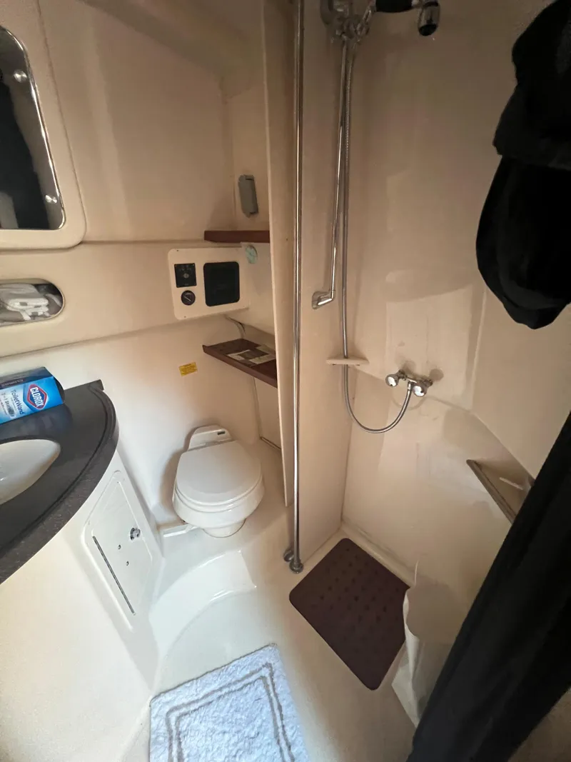 Slide: The Image of 2006 Grady-White 360 Express boat bathroom with shower and toilet. - 16