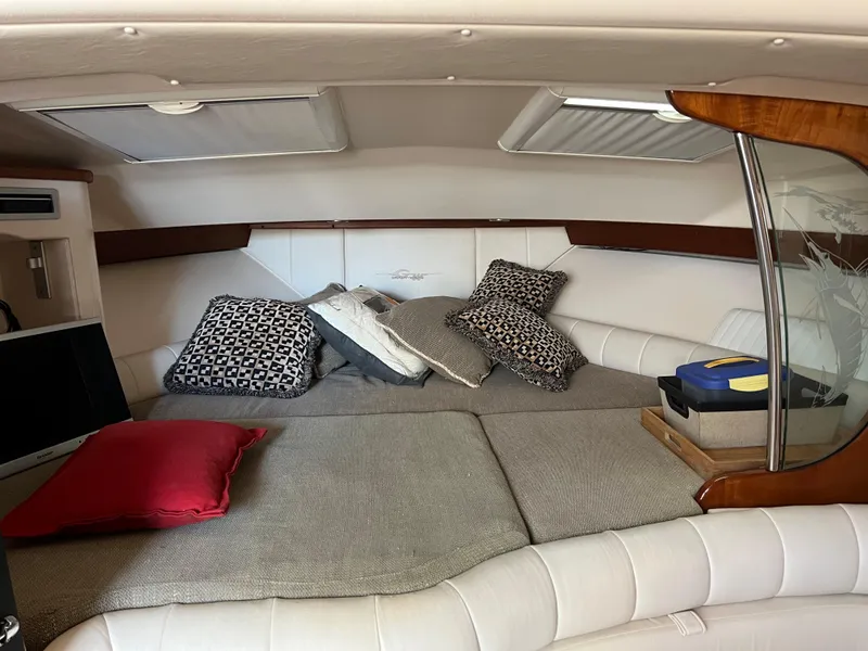 Slide: The Image of 2006 Grady-White 360 Express cabin interior with cushions and pillows. - 26