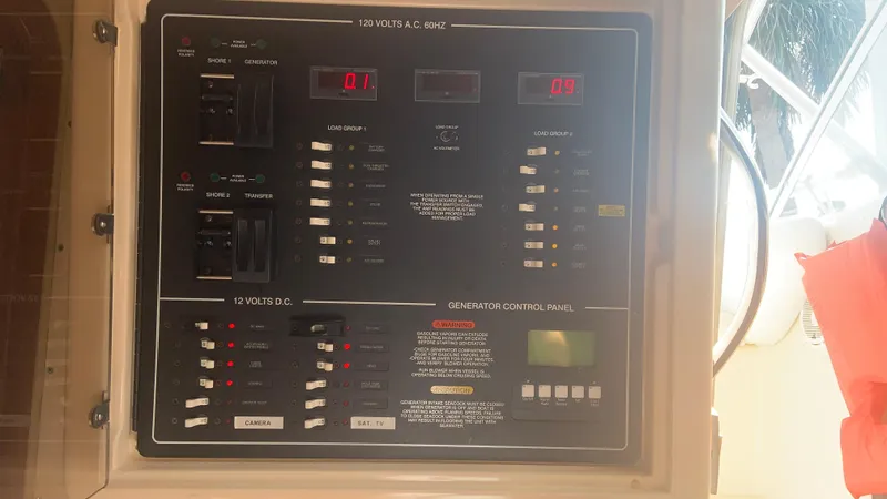 Slide: The Image of Electrical control panel on a 2006 Grady-White 360 Express boat. - 31