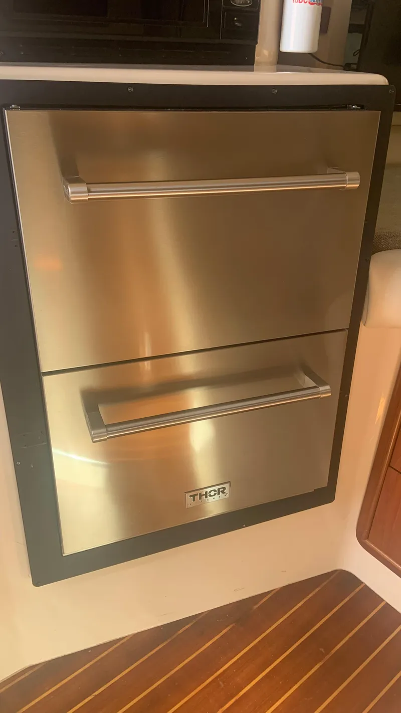 Slide: The Image of Stainless steel drawers on 2006 Grady-White 360 Express boat interior. - 39