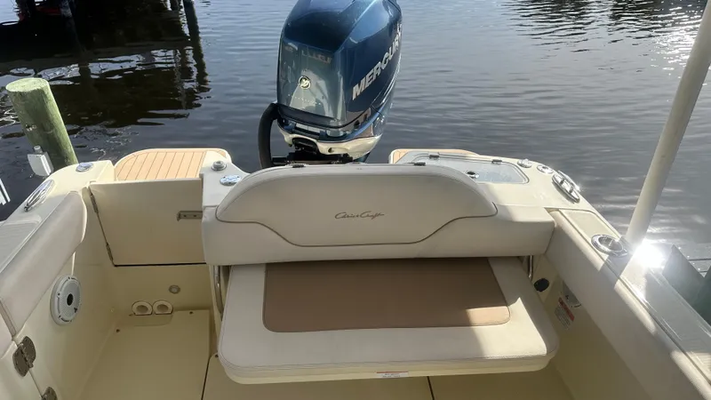 Slide: The Image of 2023 Chris-Craft Catalina 24 boat interior with Mercury outboard motor. - 21