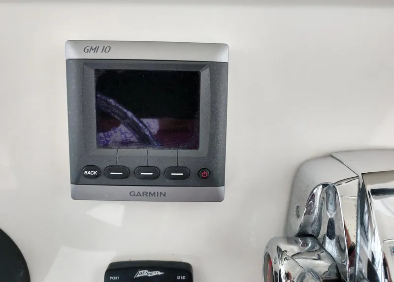 Slide: The Image of Garmin GM10 display on 2009 Intrepid 310 WA boat dashboard. - 19
