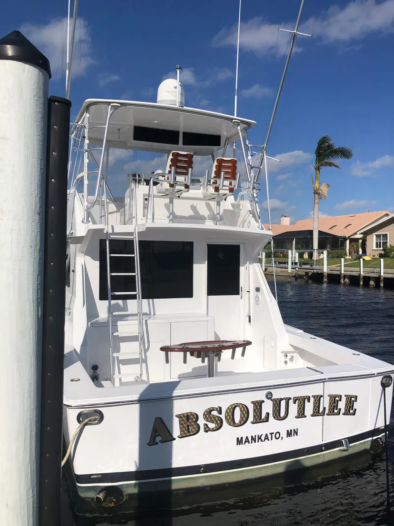 Slide: The Image of 1998 Viking 43 Convertible boat named "Absolutee" docked in Mankato, MN. - 24