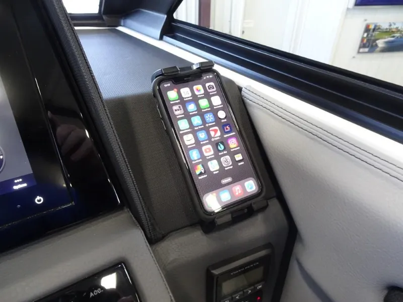 Slide: The Image of Smartphone mounted in 2025 Cobalt R4 dashboard, displaying app icons. - 17