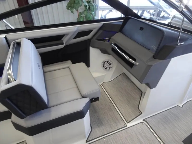 Slide: The Image of 2025 Cobalt R4 boat interior with modern seating and dashboard design. - 21